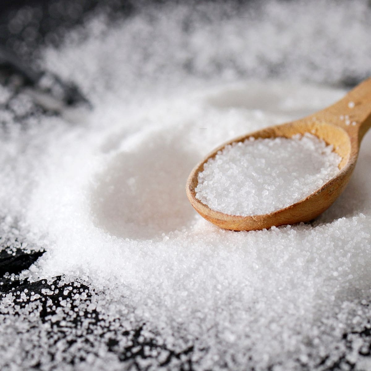 Pile of Sugar on a clean surface.